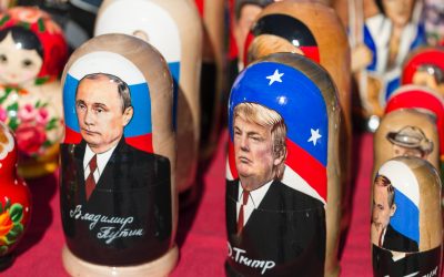 Donald Trump nesting dolls on red textile